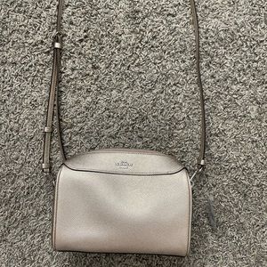 Coach gold cross body bag